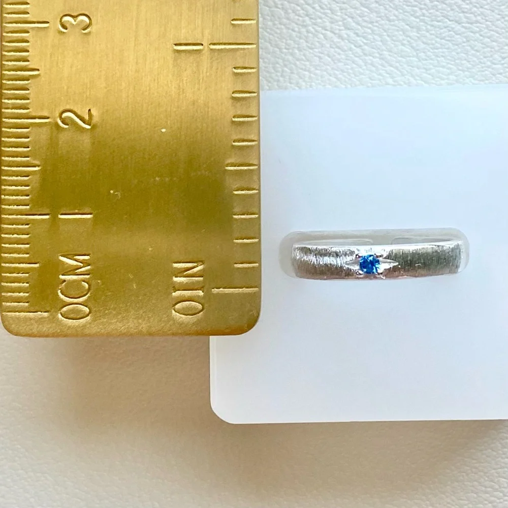 Sterling Silver Blue CZ Accent Open Band Ring